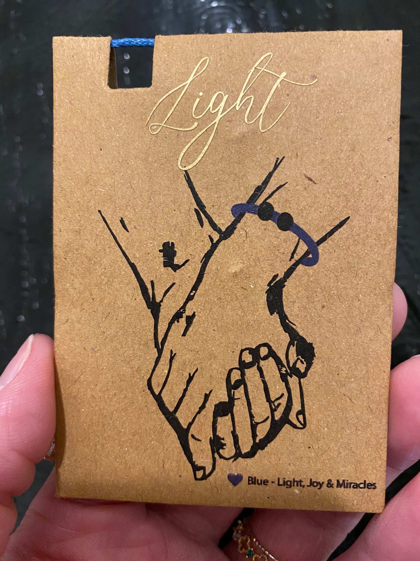 LIGHT Bracelet. Star LIGHT Charm. A Gold touch sparkled with aqua Swarvoski.